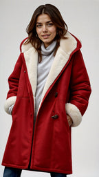 Damski płaszcz zimowy – podszyty kożuszkiem, z kapturem