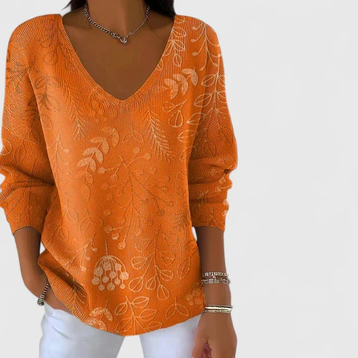 Damski sweter – dekolt w serek, wzór w liście