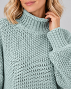 Damski sweter z golfem – gruby splot, luźny krój